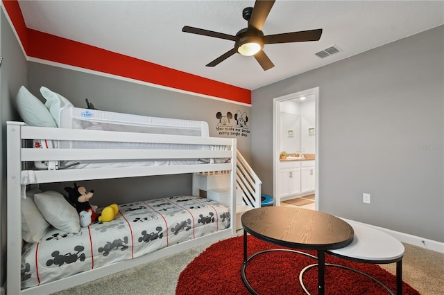4185 Paragraph Dr, Kissimmee, FL 34746 - bedroom featuring ensuite bathroom, carpet floors, and a ceiling fan