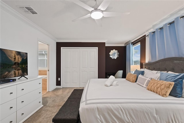 4185 Paragraph Dr, Kissimmee, FL 34746 - bedroom featuring light carpet, crown molding, a closet, and a ceiling fan
