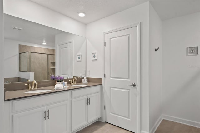 4185 Paragraph Dr, Kissimmee, FL 34746 - full bath featuring double vanity and a stall shower
