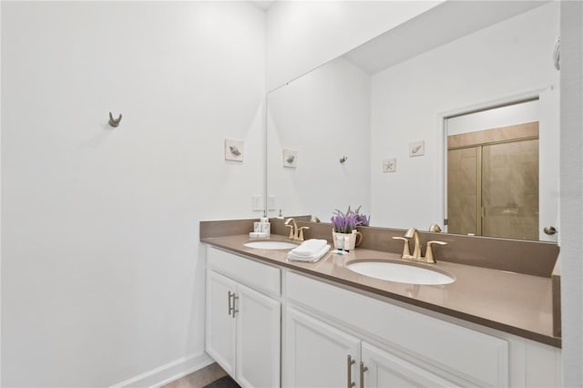 4185 Paragraph Dr, Kissimmee, FL 34746 - bathroom with double vanity and a tile shower