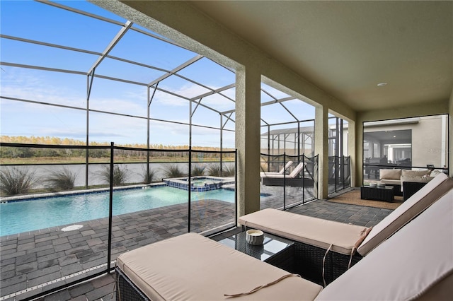 4185 Paragraph Dr, Kissimmee, FL 34746 - view of pool with outdoor lounge area, a patio area, glass enclosure, and a pool with connected hot tub