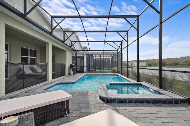 4185 Paragraph Dr, Kissimmee, FL 34746 - view of pool featuring a patio, a lanai, grilling area, and a pool with connected hot tub