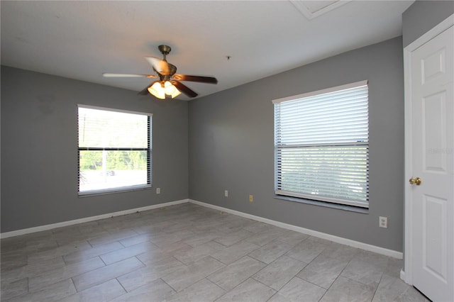 1131 S Pine Ridge Cir Unit 1, Sanford, FL 32773 - unfurnished room with a ceiling fan and baseboards