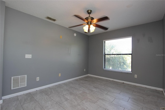 1131 S Pine Ridge Cir Unit 1, Sanford, FL 32773 - unfurnished room featuring a ceiling fan and baseboards