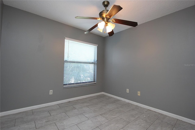 1131 S Pine Ridge Cir Unit 1, Sanford, FL 32773 - empty room with a ceiling fan and baseboards