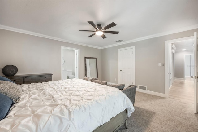 102 Linda Ln, Lake Mary, FL 32746 - bedroom with ornamental molding, light colored carpet, a ceiling fan, and ensuite bath