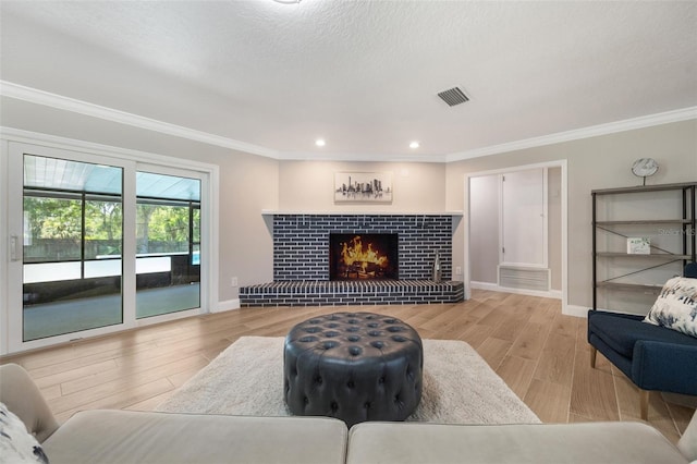 102 Linda Ln, Lake Mary, FL 32746 - living room featuring ornamental molding, wood finished floors, a fireplace, and recessed lighting