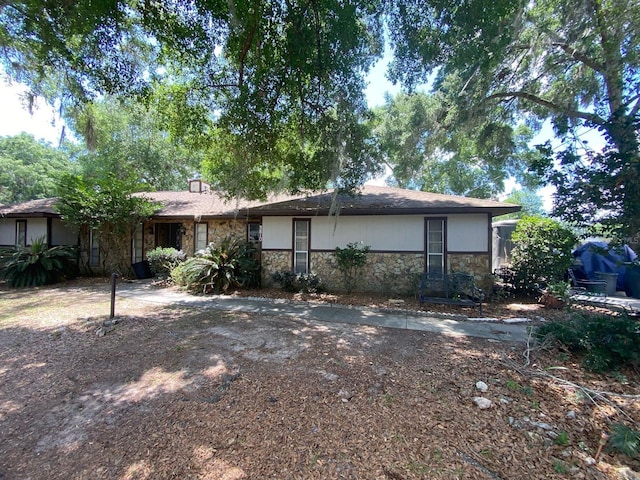 3810 SE 22nd Pl, Ocala, FL 34471 - back of property featuring stone siding