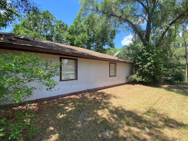 3810 SE 22nd Pl, Ocala, FL 34471 - view of side of property featuring a yard
