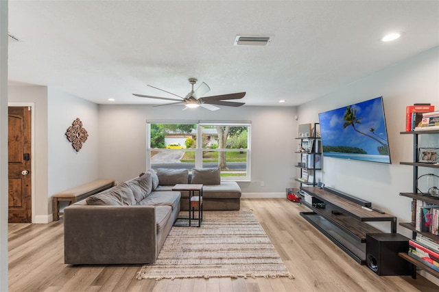 209 Carriage Hill Dr, Casselberry, FL 32707 - living room with ceiling fan, wood finished floors, and recessed lighting