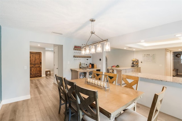 209 Carriage Hill Dr, Casselberry, FL 32707 - dining area with light wood-style floors and recessed lighting