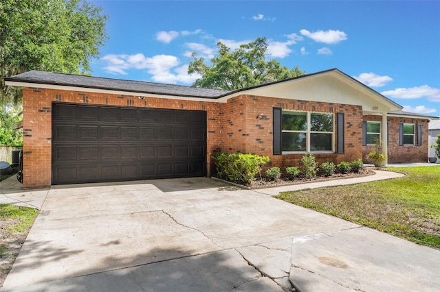 209 Carriage Hill Dr, Casselberry, FL 32707 - ranch-style house with driveway, a garage, and brick siding