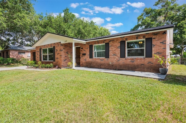 209 Carriage Hill Dr, Casselberry, FL 32707 - ranch-style house featuring brick siding and a front yard