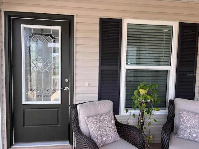 3328 Davis Ter, The Villages, FL 32163 - doorway to property featuring a porch