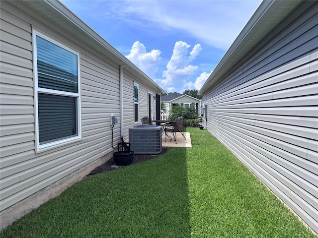 3328 Davis Ter, The Villages, FL 32163 - view of grassy yard featuring a patio area