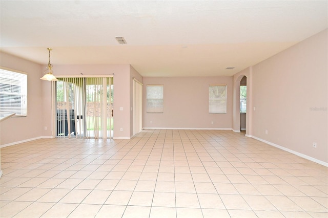 9223 Leeland Archer Blvd, Orlando, FL 32836 - unfurnished room with baseboards and arched walkways