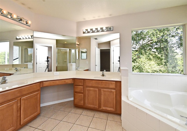 9223 Leeland Archer Blvd, Orlando, FL 32836 - full bath featuring a stall shower, tile patterned floors, double vanity, and a bath