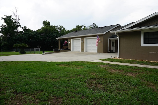 13785 SE 39th Ter, Summerfield, FL 34491 - view of side of home with concrete driveway, stucco siding, and a garage