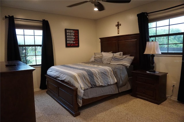 13785 SE 39th Ter, Summerfield, FL 34491 - bedroom with light colored carpet, a ceiling fan, and recessed lighting