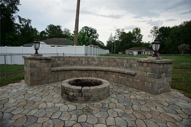 13785 SE 39th Ter, Summerfield, FL 34491 - view of patio / terrace with an outdoor fire pit