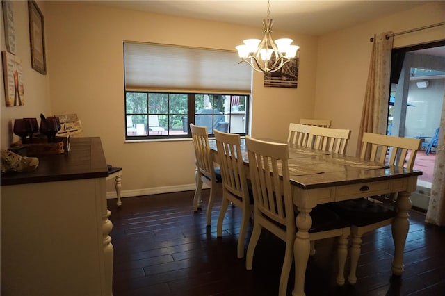 13785 SE 39th Ter, Summerfield, FL 34491 - dining area featuring dark wood finished floors and a chandelier