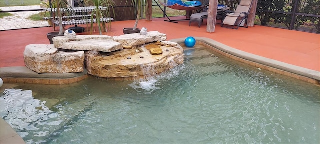 13785 SE 39th Ter, Summerfield, FL 34491 - view of pool featuring a patio area