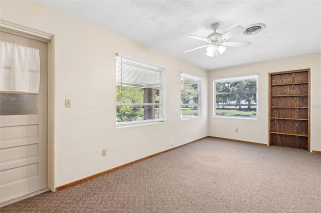 146 Mills Rd, Deland, FL 32724 - carpeted spare room featuring plenty of natural light and ceiling fan