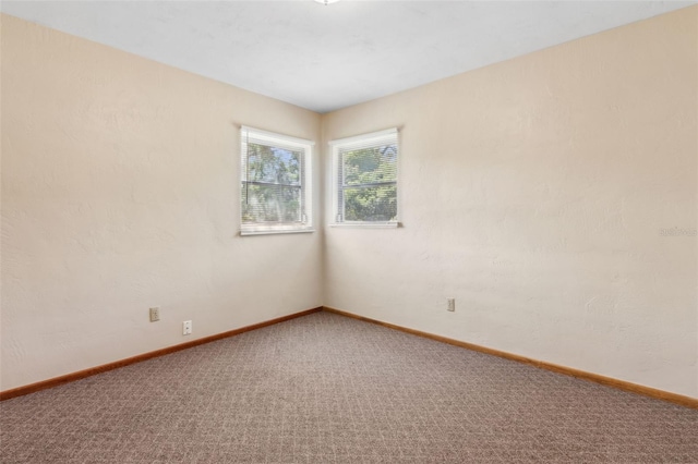 146 Mills Rd, Deland, FL 32724 - empty room featuring carpet and baseboards