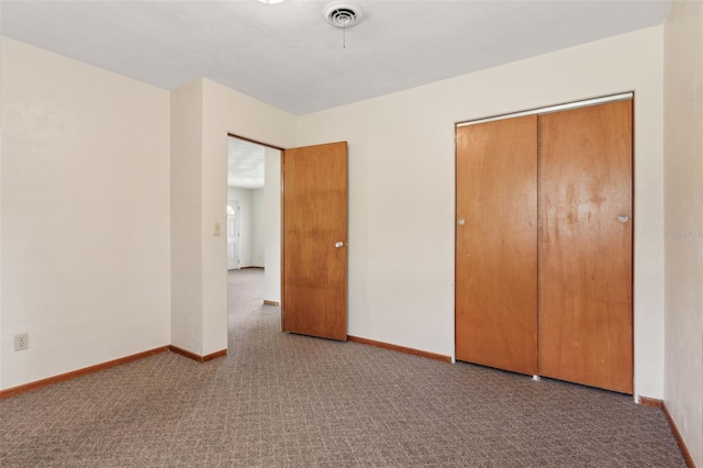 146 Mills Rd, Deland, FL 32724 - unfurnished bedroom featuring carpet and a closet