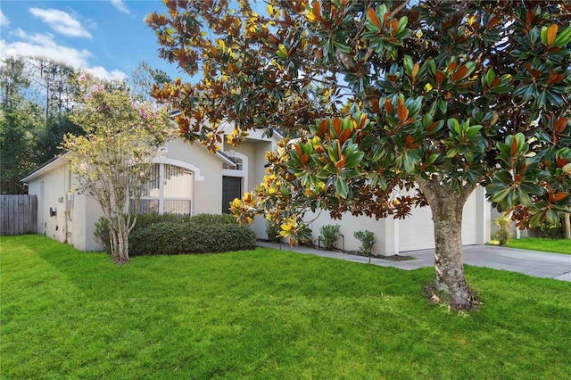16603 Corner Lake Dr, Orlando, FL 32820 - obstructed view of property featuring stucco siding and driveway
