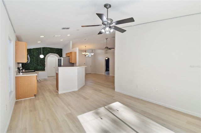 16603 Corner Lake Dr, Orlando, FL 32820 - unfurnished living room with arched walkways, a ceiling fan, vaulted ceiling, light wood-style floors, and recessed lighting