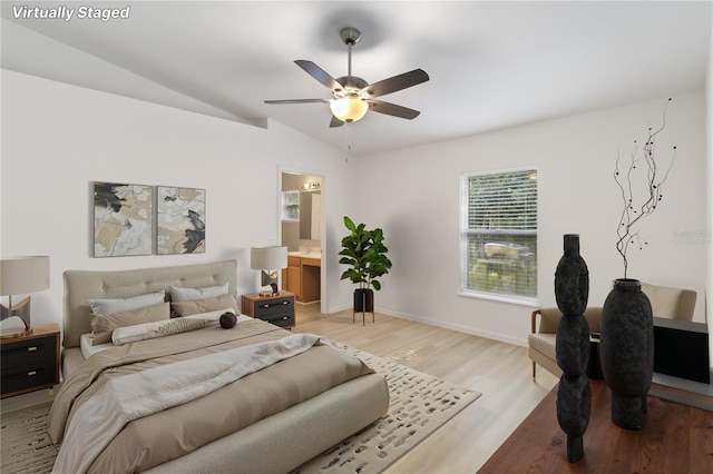 16603 Corner Lake Dr, Orlando, FL 32820 - bedroom featuring light wood finished floors, vaulted ceiling, ensuite bathroom, and ceiling fan