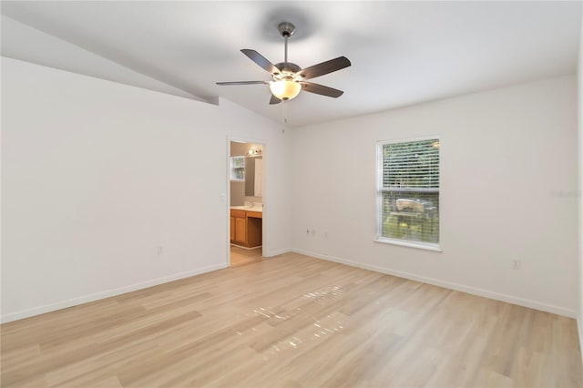 16603 Corner Lake Dr, Orlando, FL 32820 - empty room featuring ceiling fan, light wood-style floors, and vaulted ceiling