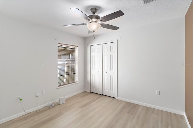16603 Corner Lake Dr, Orlando, FL 32820 - unfurnished bedroom with light wood finished floors, a closet, and ceiling fan