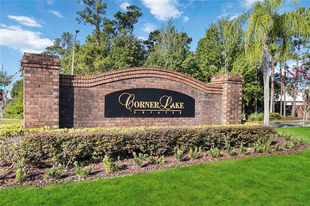 16603 Corner Lake Dr, Orlando, FL 32820 - community / neighborhood sign with a yard