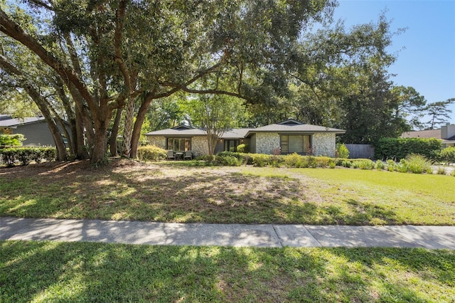 1029 Antelope Trl, Winter Springs, FL 32708 - mid-century inspired home featuring stone siding and a front yard