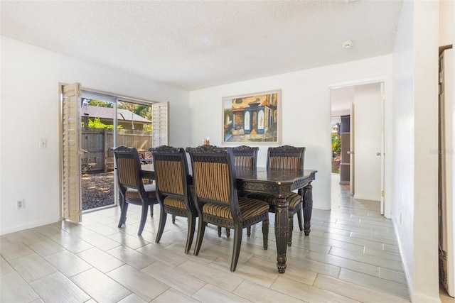 1029 Antelope Trl, Winter Springs, FL 32708 - dining space featuring a textured ceiling and wood finish floors