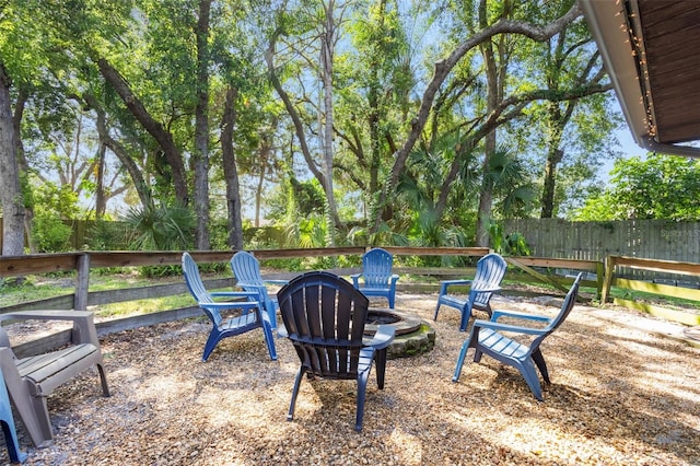 1029 Antelope Trl, Winter Springs, FL 32708 - fenced backyard featuring an outdoor fire pit