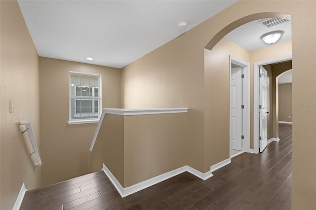 480 Buckhorn Dr, Winter Springs, FL 32708 - corridor with arched walkways, wood finished floors, an upstairs landing, and recessed lighting