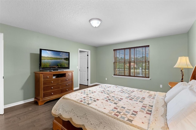 480 Buckhorn Dr, Winter Springs, FL 32708 - bedroom with dark wood-style flooring and a textured ceiling
