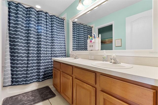 207 Via Tuscany Loop, Lake Mary, FL 32746 - bathroom featuring double vanity, tile patterned floors, and shower / bath combination with curtain