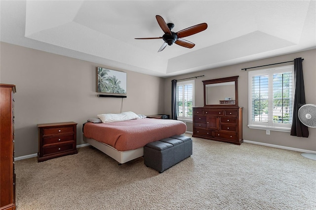 207 Via Tuscany Loop, Lake Mary, FL 32746 - bedroom featuring a tray ceiling, carpet, and ceiling fan