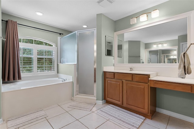 207 Via Tuscany Loop, Lake Mary, FL 32746 - bathroom with a stall shower, a bath, vanity, and tile patterned floors