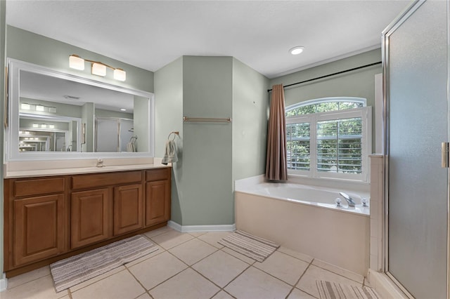 207 Via Tuscany Loop, Lake Mary, FL 32746 - full bathroom with a bath, vanity, a stall shower, and tile patterned flooring