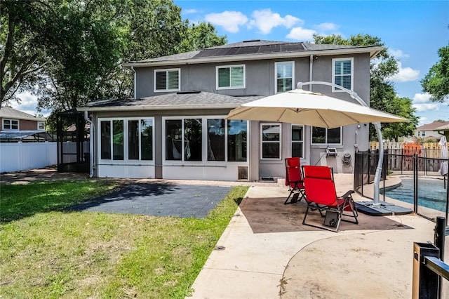 207 Via Tuscany Loop, Lake Mary, FL 32746 - back of house featuring stucco siding, a fenced backyard, and a patio area