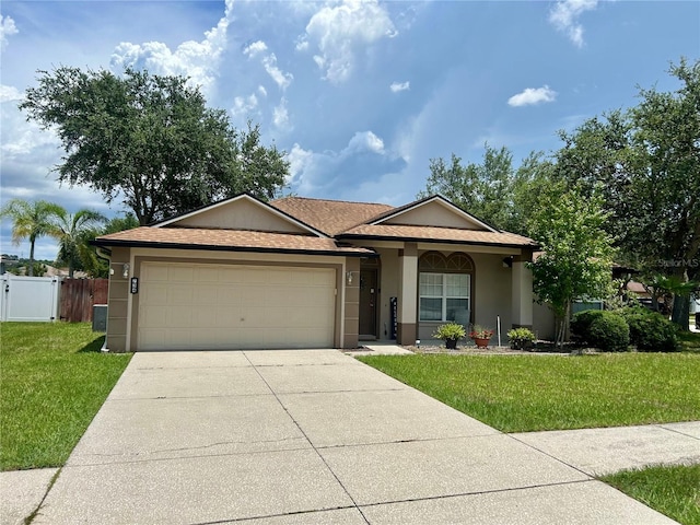 734 La Costa St, Minneola, FL 34715 - ranch-style house with stucco siding, an attached garage, concrete driveway, and a shingled roof