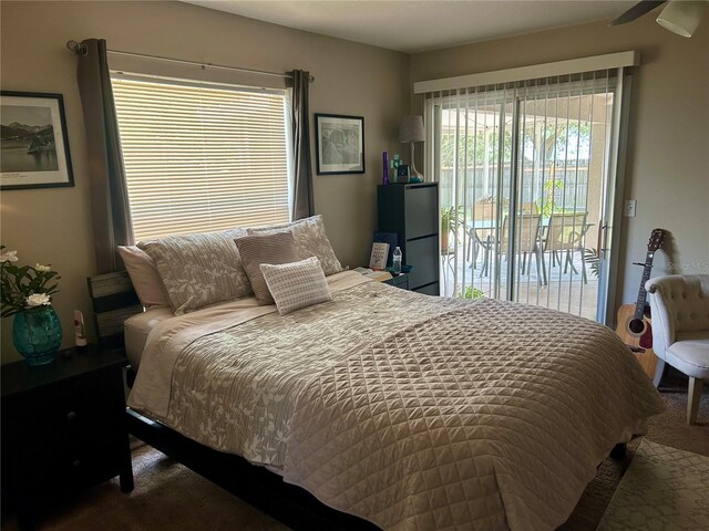 734 La Costa St, Minneola, FL 34715 - carpeted bedroom featuring access to exterior