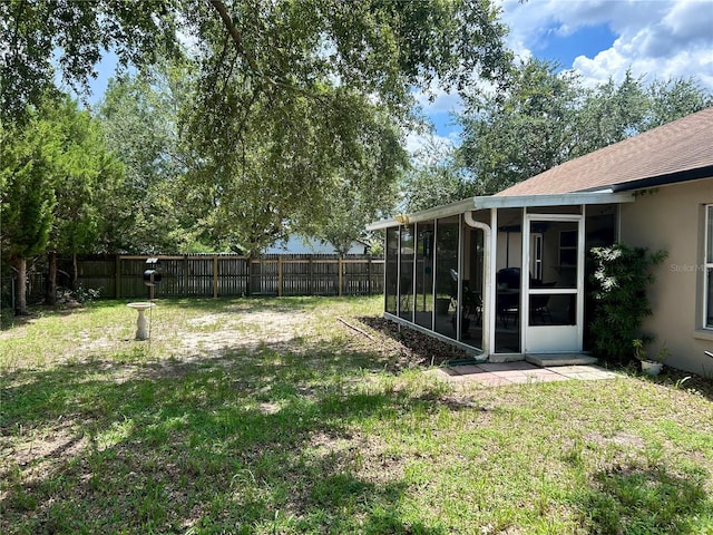 734 La Costa St, Minneola, FL 34715 - fenced backyard with a sunroom
