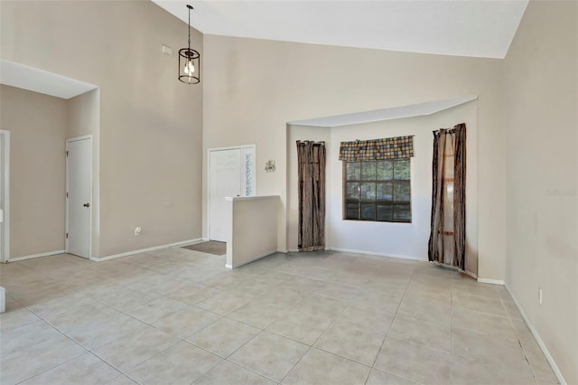 1039 Eagles Forrest Dr, Apopka, FL 32712 - unfurnished living room with light tile patterned floors and high vaulted ceiling