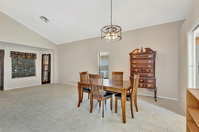 1039 Eagles Forrest Dr, Apopka, FL 32712 - dining area with vaulted ceiling, a chandelier, and light tile patterned floors